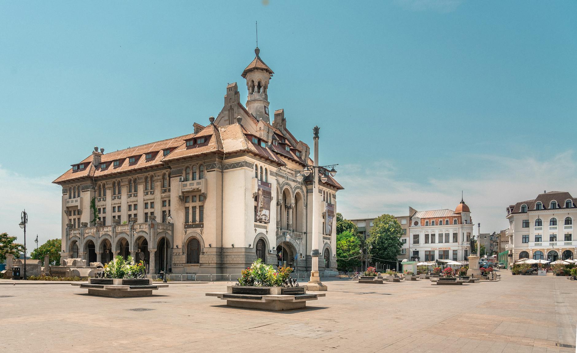 a large building with a clock tower in the middle