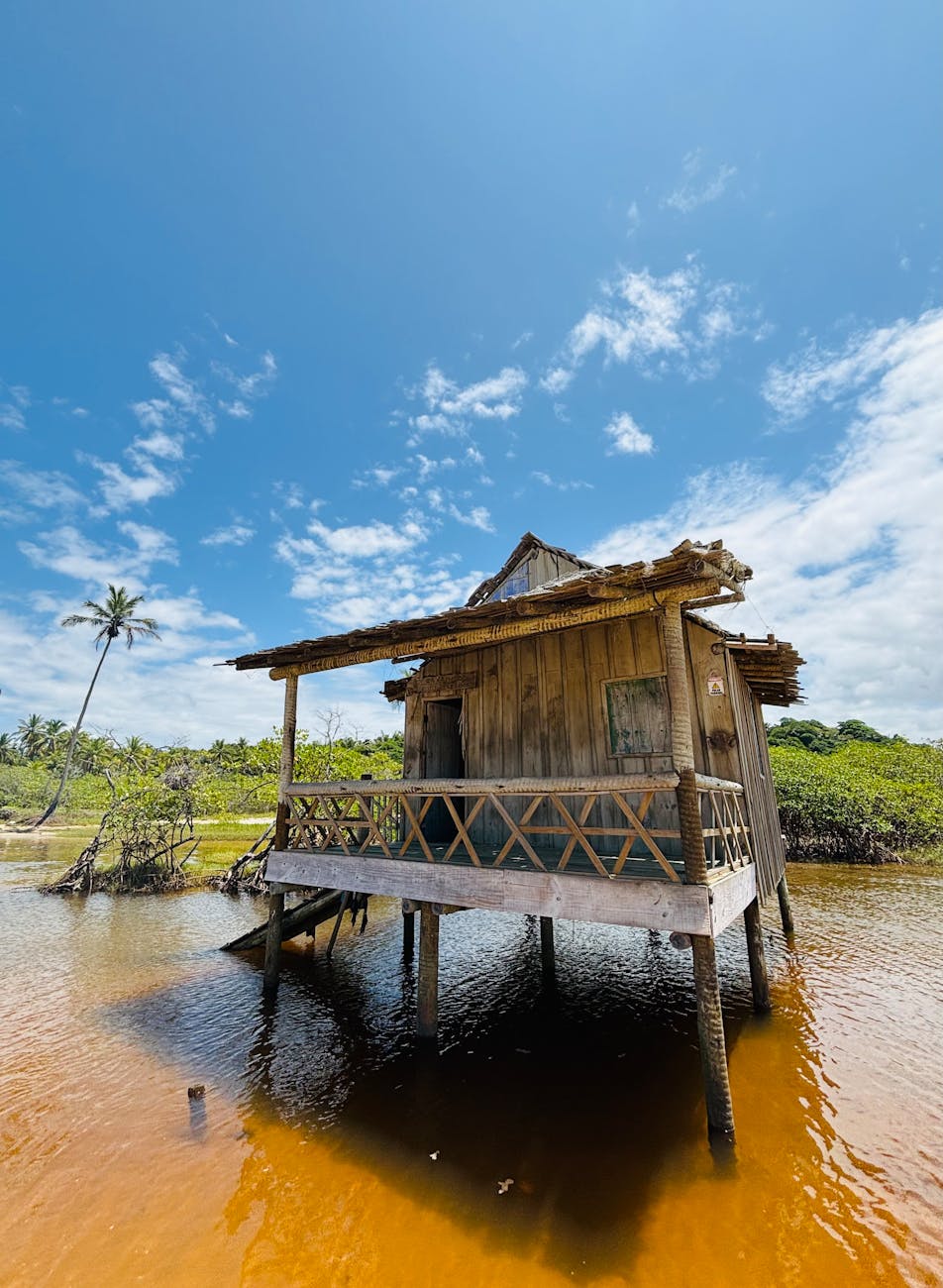 rustic wooden hut in trancoso brazil lagoon